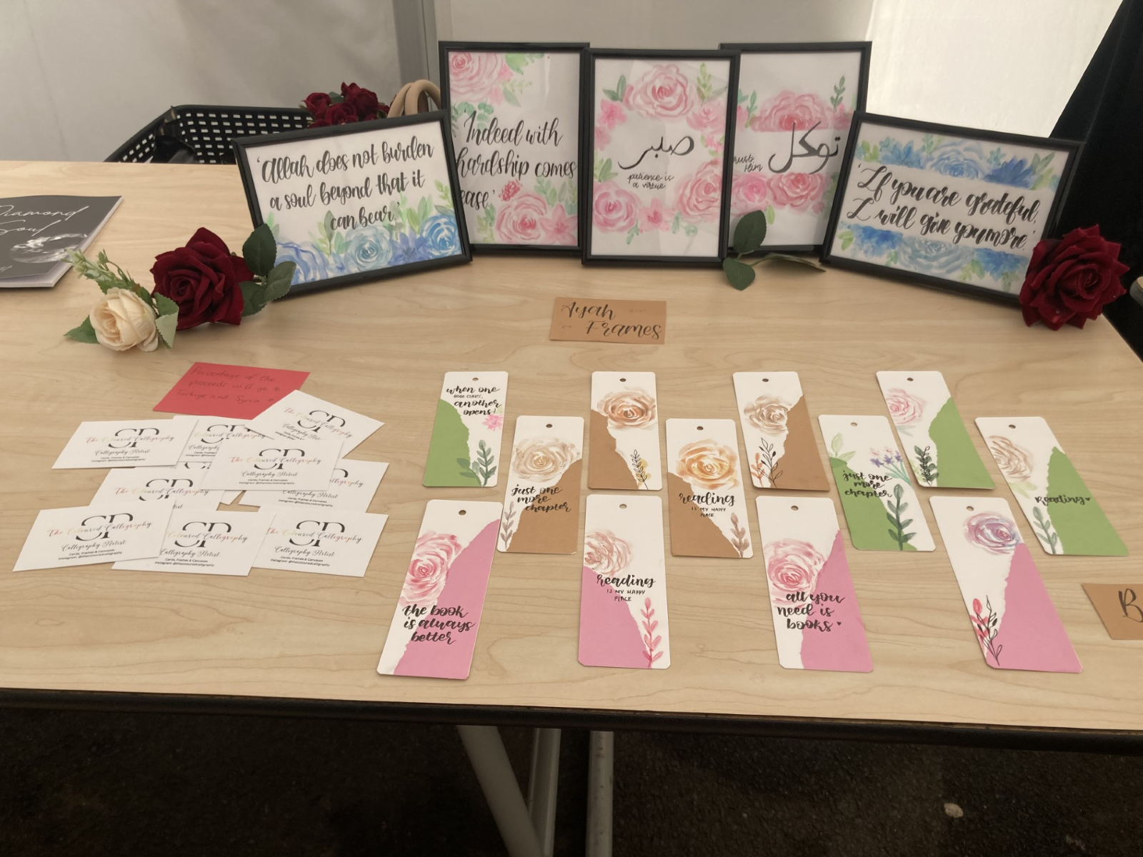 Eid Mubarak greeting cards and ayah frames laid out for sale