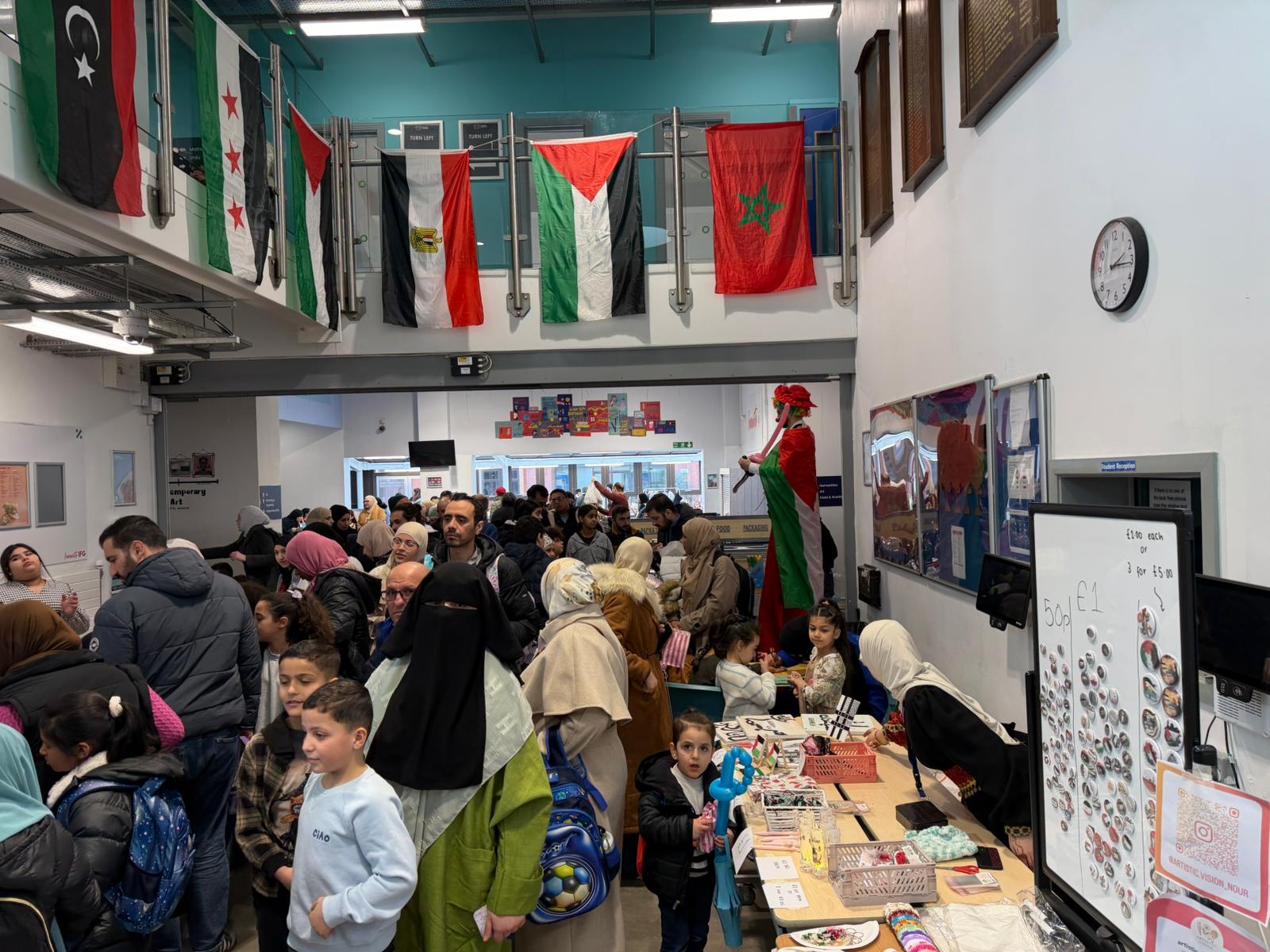 A long buffet of Arabic dishes prepared by parents and teachers