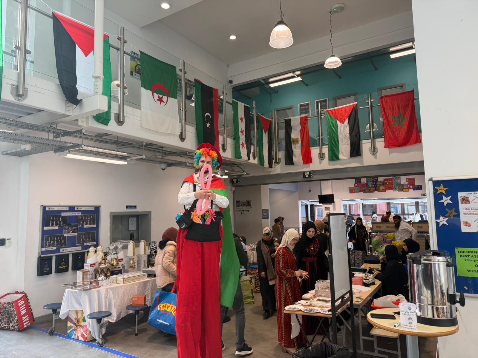 The culture day bazaar entrance, framed by the flags of Arab nations